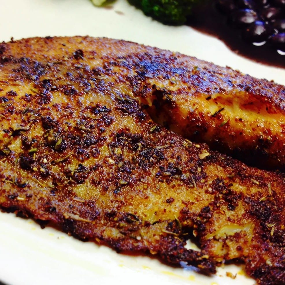 Blackened Tilapia Filet with Vegetable Rice.